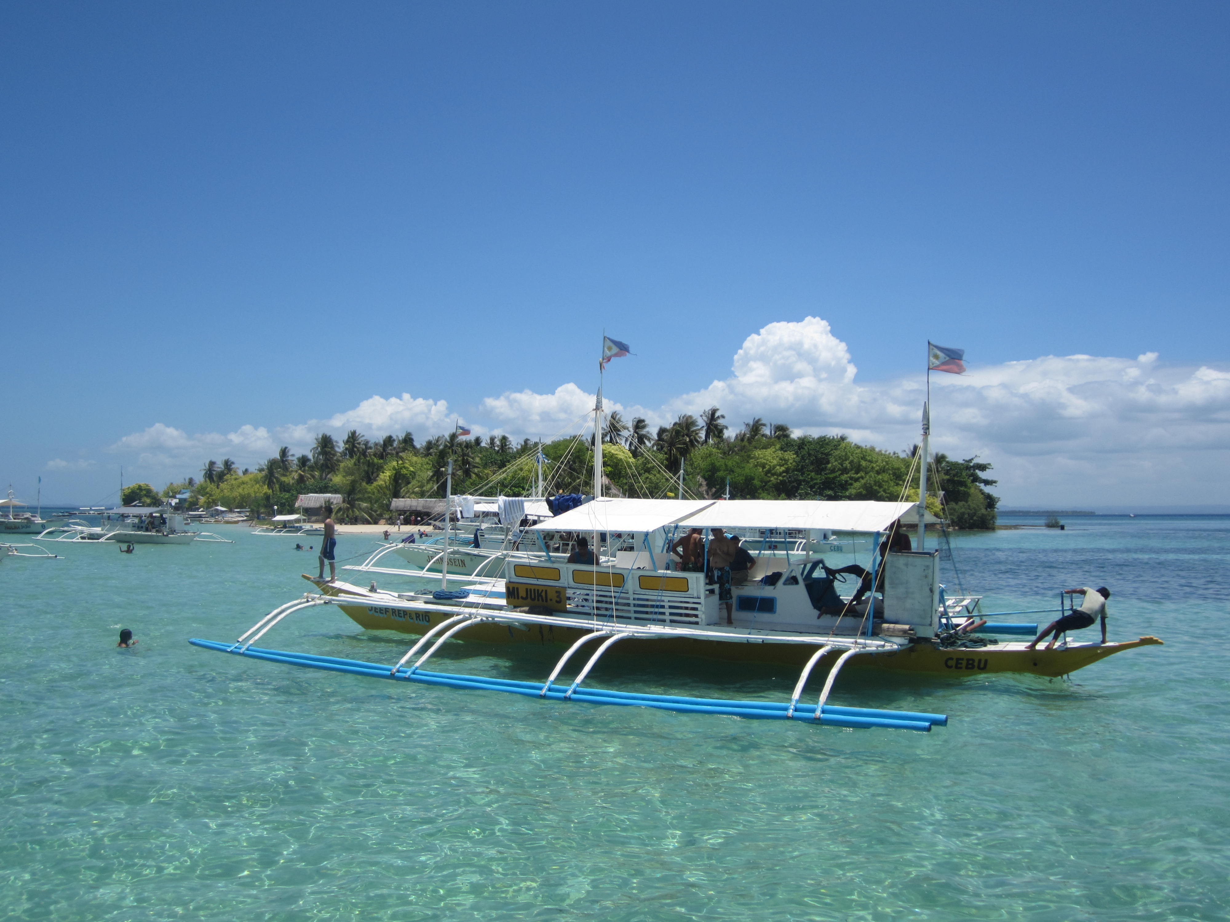 Pandanon Island and Nalusuan Island Hopping Tour - Cebu Travel Agency